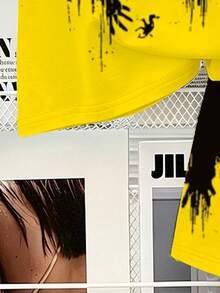 Babylove Nauru 2-piece baby boy summer outfit featuring a bright yellow t-shirt and shorts with black ink splatter