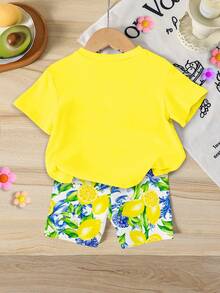 SHEIN 1 Set Baby Girls' Sweet Cute Lemon Fruit & Letter Print Vacation Style Short Sleeve Round Neck T-Shirt And Shorts Set, Suitable For Spring To Summer