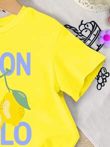 SHEIN 1 Set Baby Girls' Sweet Cute Lemon Fruit & Letter Print Vacation Style Short Sleeve Round Neck T-Shirt And Shorts Set, Suitable For Spring To Summer