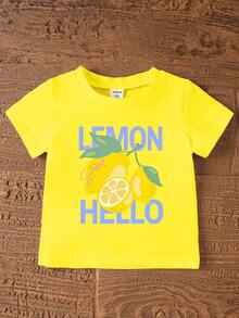 SHEIN 1 Set Baby Girls' Sweet Cute Lemon Fruit & Letter Print Vacation Style Short Sleeve Round Neck T-Shirt And Shorts Set, Suitable For Spring To Summer