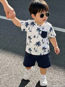 SHEIN Bubblio 2pcs Baby Boy Coconut Tree Print Pattern Soft Knit Patchwork Pocket Round Neck Short Sleeve Top T-Shirt And Elastic Waist Shorts Set Beach Outfit Sets