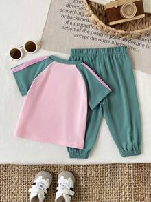 SHEIN Baby Girl 2pcs/Set Spring Summer Outfits Green And Pink Casual Vacation Sport Style Embroidery Decoration Short Puffed Sleeves Top&Stripe Long Pants