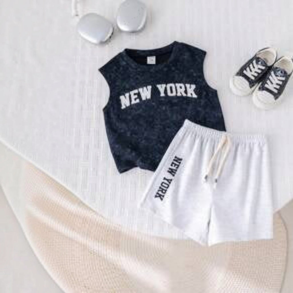 Babylove Nauru toddler boy summer outfit with navy acid-wash vest top and grey shorts featuring New York text print
